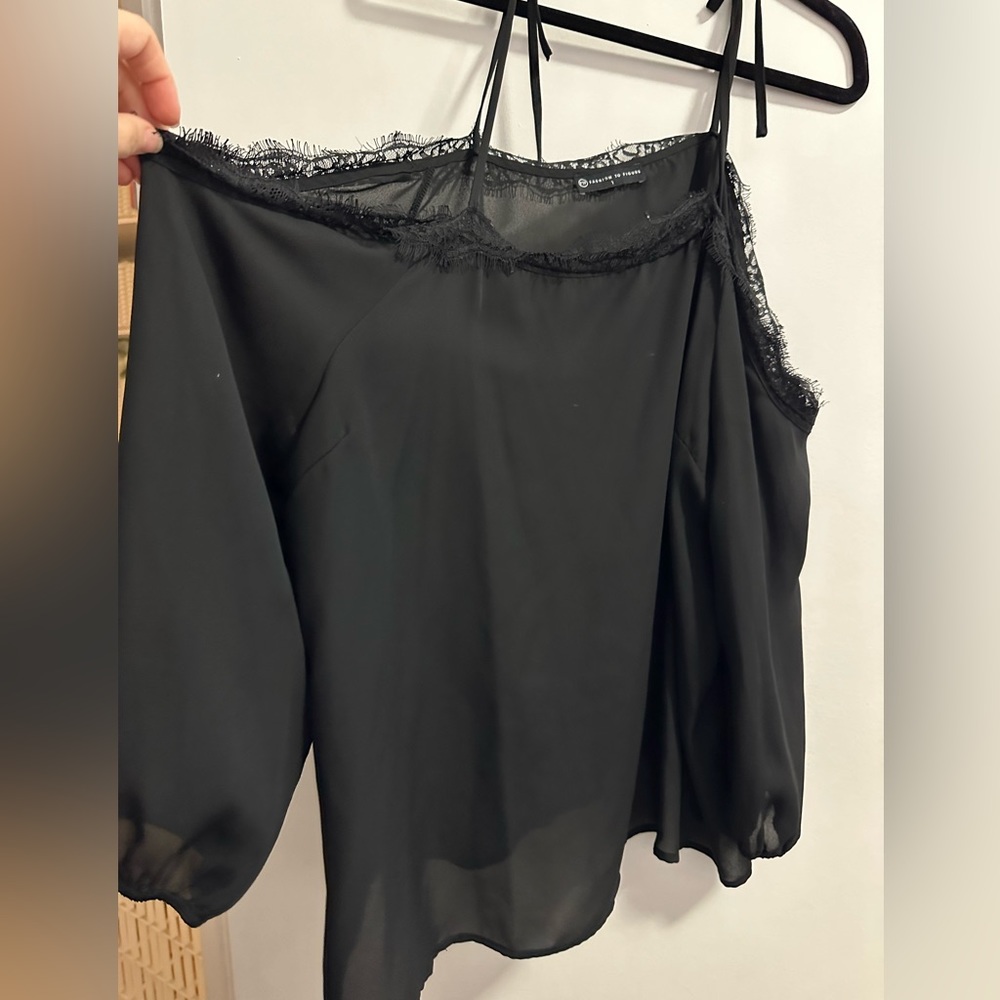 Over sized, off the shoulder black satin blouse
